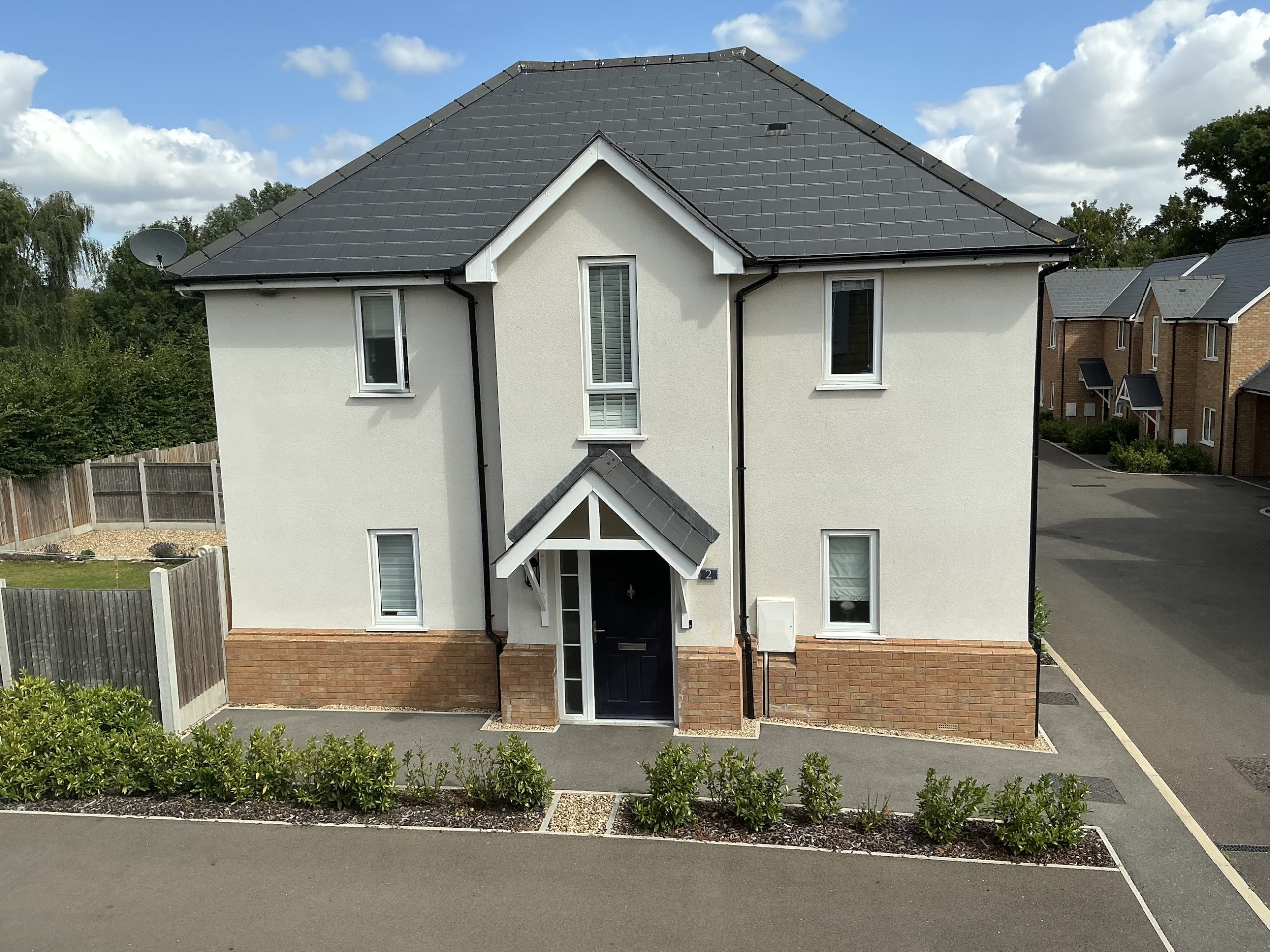 exterior view of a cream house