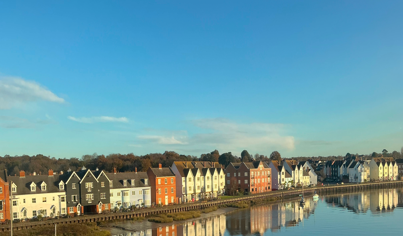 Row of houses in front of water